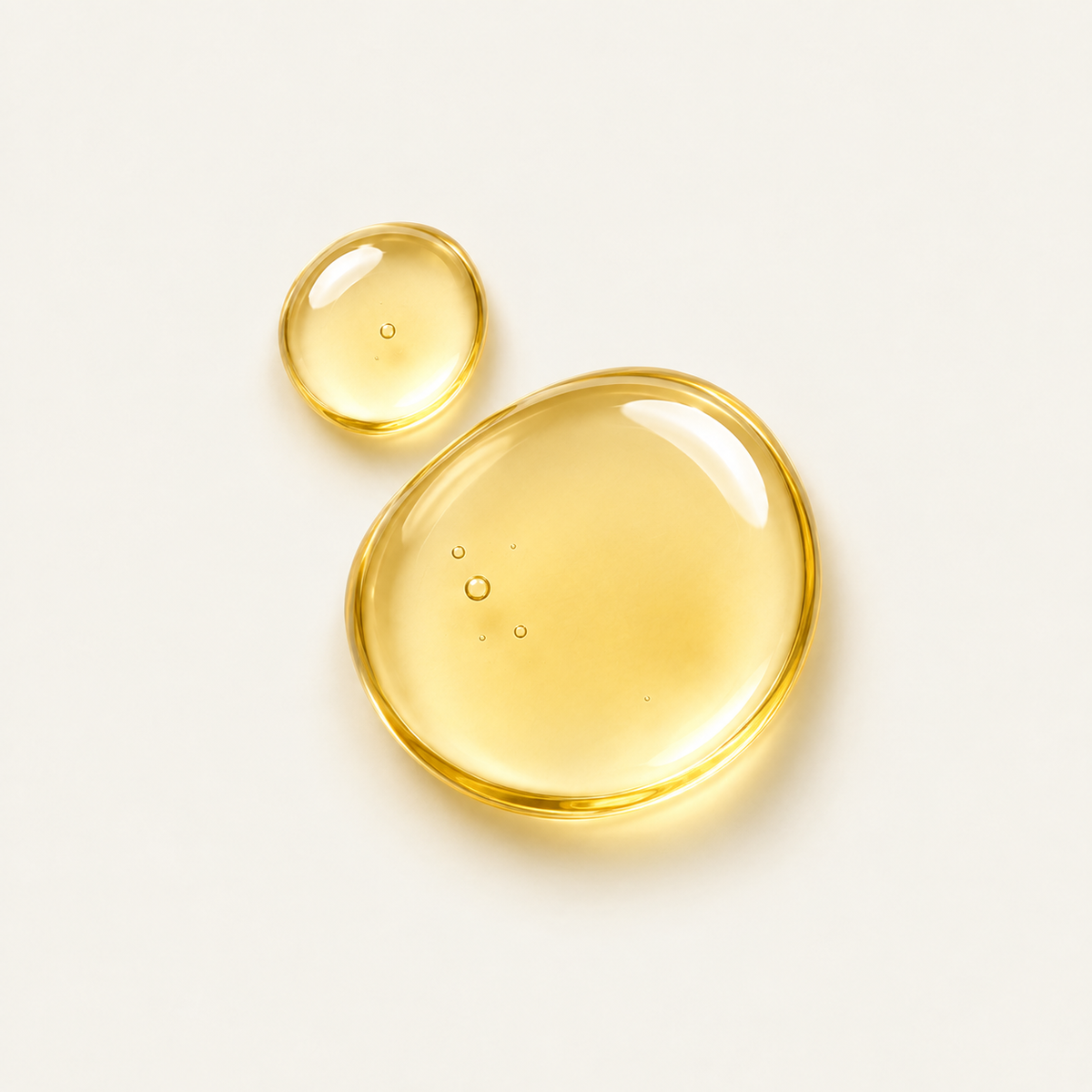 Golden oil droplets representing vitamin E